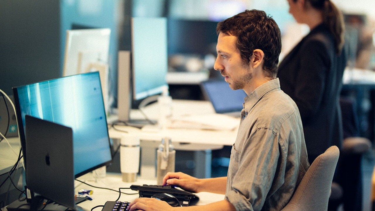 man working on laptop