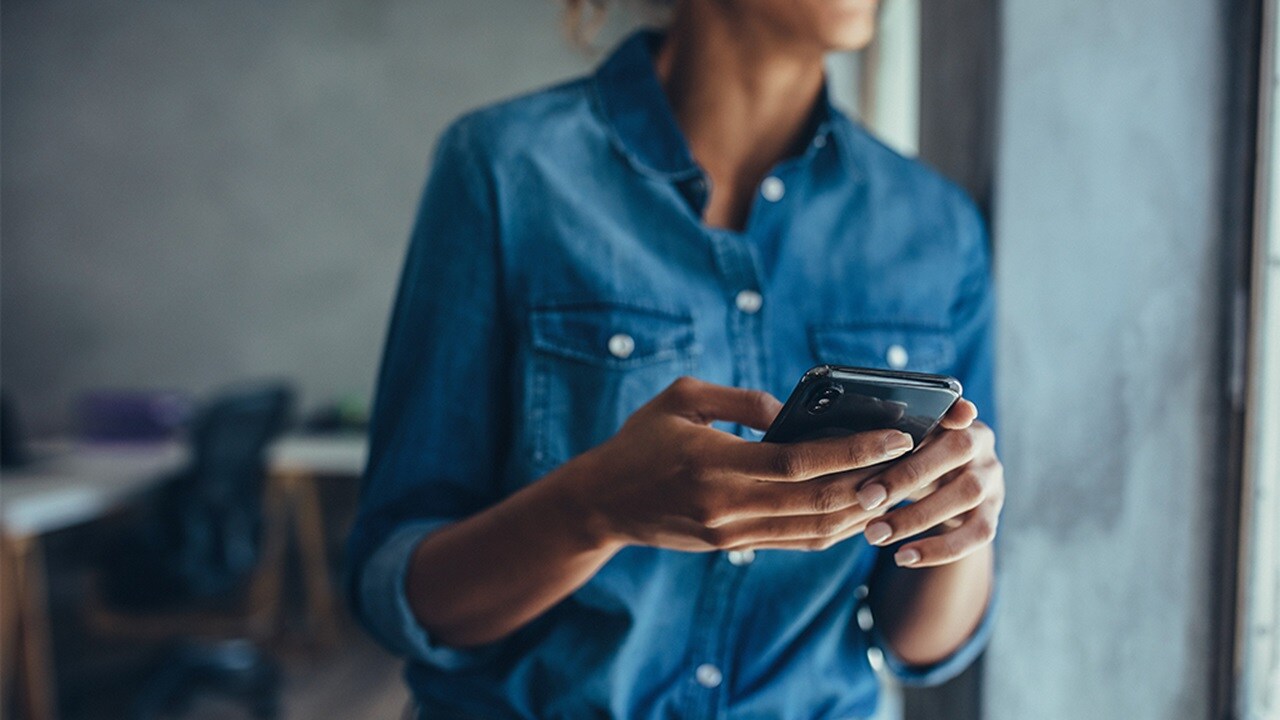 A female using her phone